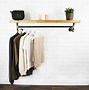 Image result for Wall Mounted Clothes Rail. Shop Fitting