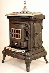 Image result for Victorian Enamel and Cast Iron Parlor Stoves