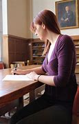 Image result for Student Sitting at Desk Writing