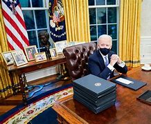Image result for Joe Biden Sitting at a Desk