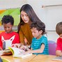 Image result for Seniors Reading to Kids Diverse