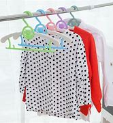Image result for Child Shaped Clothes Hanger