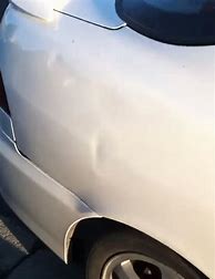 Image result for Pulling Dent From Car Door