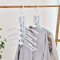 Image result for Multi Clothes Hanger That Rotates