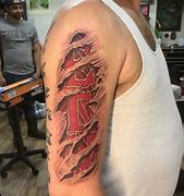 Image result for Ripped Skin Tattoo Arm