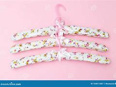 Image result for Pink Background Clothes Hangers