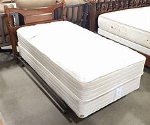 Image result for Ghostbed All-In-One Mattress Foundation - Twin XL - 9" Box Spring And Bed Frame Alternative With Adjustable Legs And Headboard Brackets Included