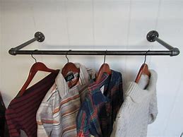 Image result for Large Wall Clothes Hanging Rack