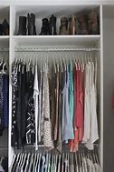 Image result for Dress Clothes to Wardrobe Hanging