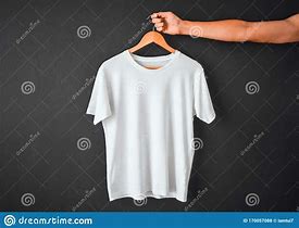 Image result for Man Holding T-Shirt Hanger