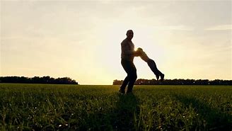 Image result for public domain picture of father holding child