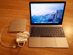 Image result for MacBook with CD Drive