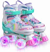 Image result for Jojo Siwa Roller Derby Quad Rainbow Colored Roller Skates For Girls - Adjustable By 4 Sizes