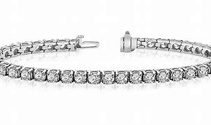 Image result for Classic Prong Illusion Set Diamond Tennis Bracelet In Platinum Or Gold