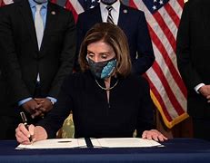 Image result for Nancy Pelosi Signs the Impeachment Documents