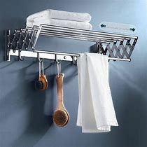 Image result for Wall Mounted Clothes Hanger System for Small Rooms