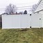 Image result for White Privacy Fence with Yellow Strip