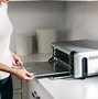 Image result for Ninja SP101 Foodi 8-In-1 Digital Air Fry Oven, Flip-Away For Storage, Dehydrate, Keep Warm - Black/Stainless Steel