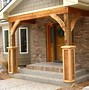 Image result for Brick House with Cedar Columns Front Porch