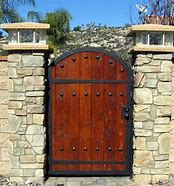 Image result for Iron and Wood Fence Gate Designs