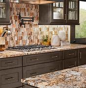 Image result for What Granite Countertop Goes with Bronze Sunset Appliance