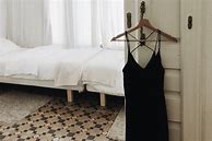 Image result for Black Dress On White Hanger
