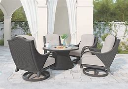 Image result for Marsh Creek Swivel Lounge With Cushion (Set Of 2), Brown By Ashley Homestore, Outdoor > Patio Furniture > Patio Seating