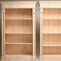 Image result for Corner Bookcase with Doors