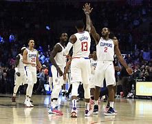 Image result for Paul George High Fiving Kawhi