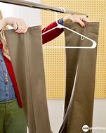 Image result for Folding Pants On a Hanger