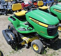 Image result for John Deere X300 Riding Lawn Mower