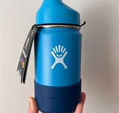 Image result for Hydro Flask 20 Oz. Kids' Wide Mouth Bottle With Straw Lid And Boot, Blue