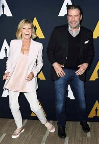 Image result for John Travolta and Olivia Newton Hugging Images
