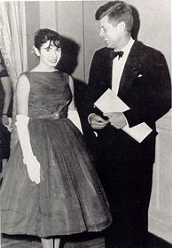 Image result for Pelosi Standing Next to Kennedy