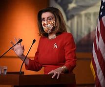 Image result for Nancy Pelosi with Trump Haircut
