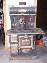 Image result for Antique Gopher Wood Coal Stove