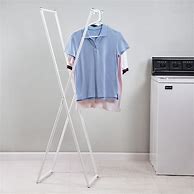 Image result for Clothes Folding Table and Hanger Rack