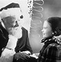 Image result for Picture of Kurt Russell as Santa Claus