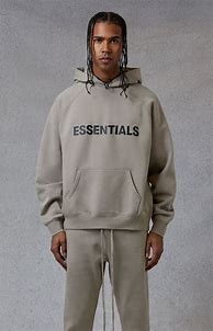Image result for Fear of God Essentials Hoodie Cream