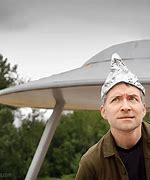 Image result for Actors Wearing Tin Foil Hats in the Movie Signs