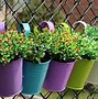 Image result for Circle Planters On Fence