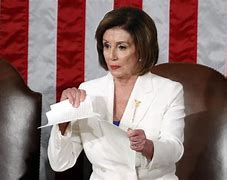 Image result for Nancy Pelosi Standing in White Before the State of the Union