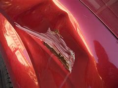 Image result for Car Dent with Crack in It