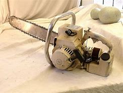 Image result for Antique Poulan Chainsaw