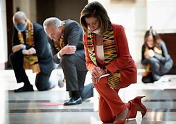 Image result for Joe Biden and Nancy Pelosi Kneeling in Kente Cloths
