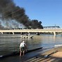 Image result for Fire at Tempe Bridge