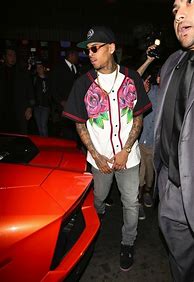 Image result for Chris Brown Wearing Rose Jordan's