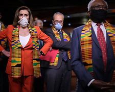 Image result for Pelosi Wearing African Cloth