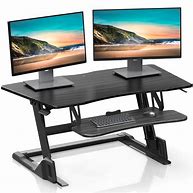 Image result for adjustable desk stand