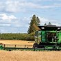 Image result for Early Combine Harvester